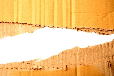 Gap in corrugated cardboard on white backgroundの写真素材
