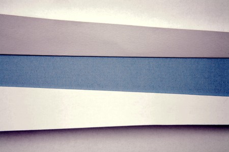 Ripped  paper on blue background 