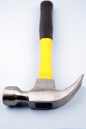 Claw hammer on blue backgroundの写真素材