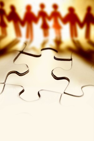 Group of people and jigsaw puzzleの写真素材