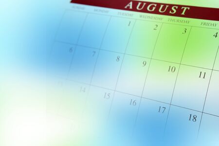 Calendar page on color backgroundの写真素材
