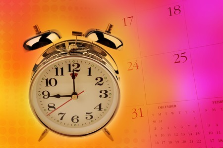 Alarm clock and calendar numbers on color backgroundの写真素材