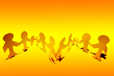 Paper doll family holding hands の写真素材