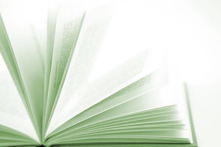 Open book on plain backgroundの写真素材