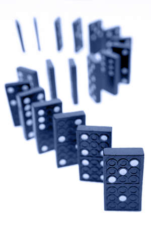 Dominoes standing on plain backgroundの写真素材