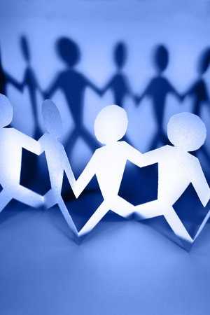 Paperchain people holding handsの写真素材