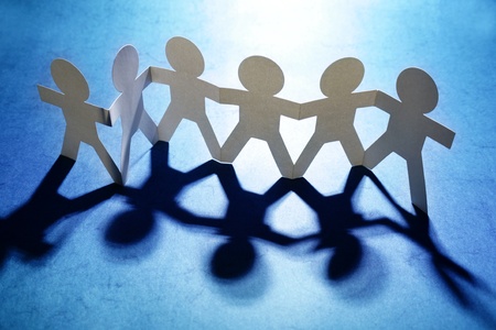 Group of people holding hands
