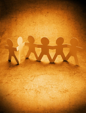 Group of six people holding handsの写真素材