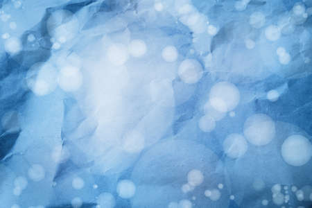 Abstract circles of light on blue backgroundの写真素材