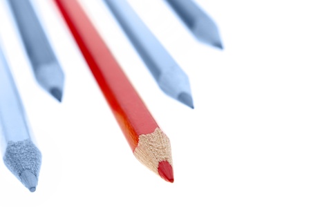 One red pencil standing out from dull pencilsの写真素材