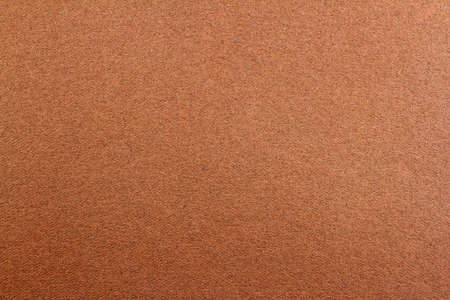Closeup of textured brown background