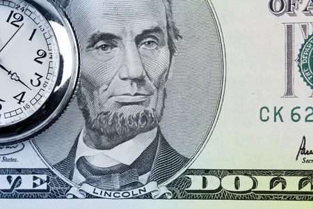 Pocket watch and banknote. Time is money conceptの写真素材