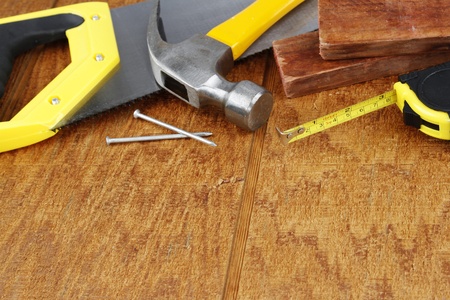 Assorted work tools on woodのeditorial素材