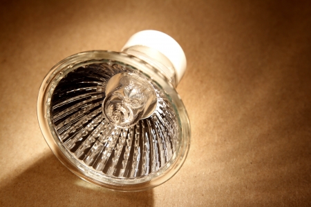 Halogen light bulb on brown backgroundの写真素材