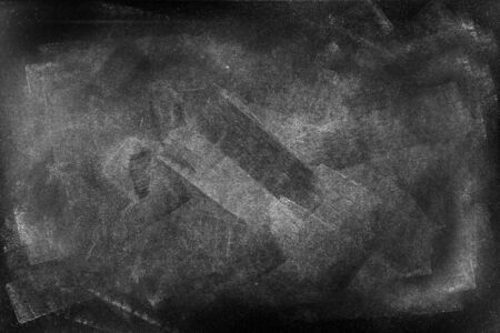 Chalk rubbed out on blackboard