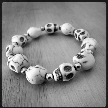 Closeup of spooky skulls braceletの写真素材