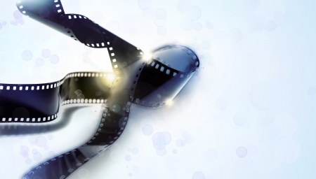 Strips of film on blue tone backgroundの写真素材