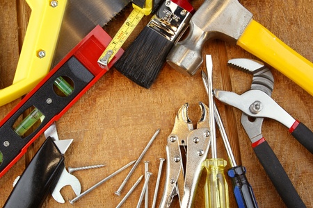 Assorted work tools on wood