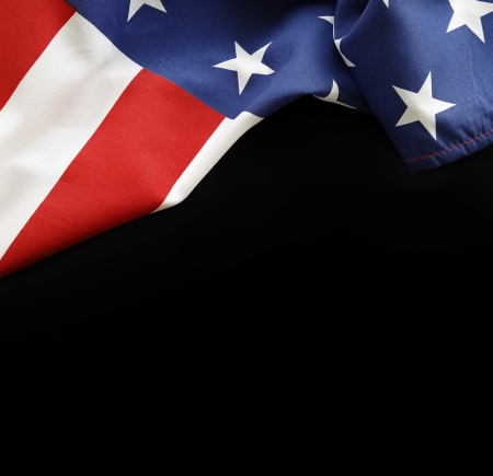 Closeup of American flag on black backgroundの写真素材