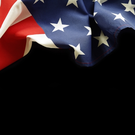 Closeup of American flag on black backgroundの写真素材