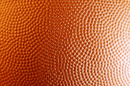 Closeup of orange basketball textureの写真素材