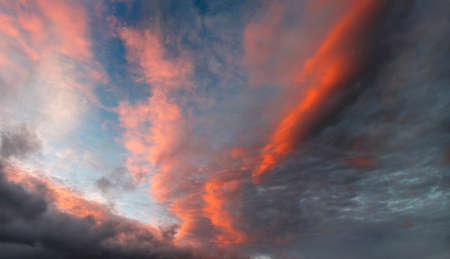Bright orange and color in sunset clouds