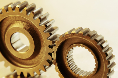 Closeup of two metal cog gearsの写真素材