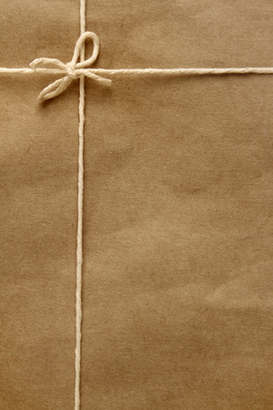 Tied knot on brown parcelの写真素材