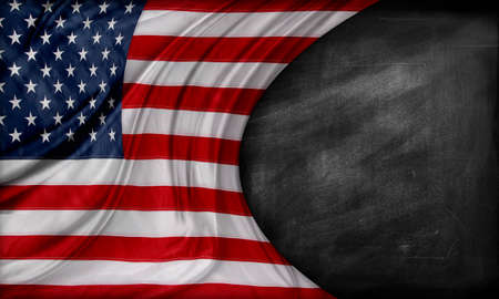 American flag in front of blackboard