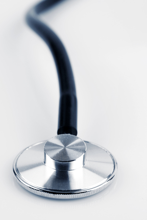 Stethoscope closeup on plain backgroundの写真素材