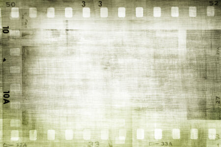 Film negative frames on textured backgroundの写真素材