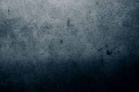Grunge blue textured wall closeup
