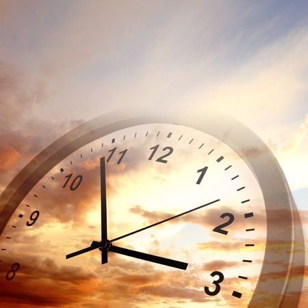 Clock face in bright sky