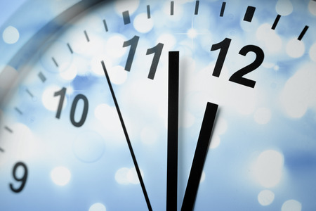 Clock face and abstract background. New Year. Christmas