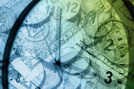 Clock face and American currencyの写真素材