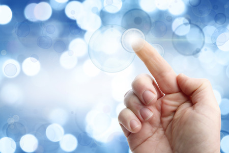 Finger tapping button on touchscreen