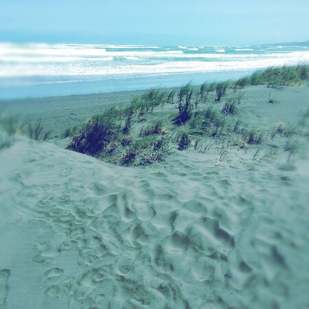 Sand and surf at Raglan, New Zealand