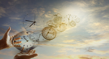 Hands and clocks in sky Hands and clocks in sky