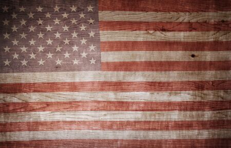 Closeup of American flag on woodの写真素材