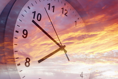 Clock face in bright sky Clock face in bright sky