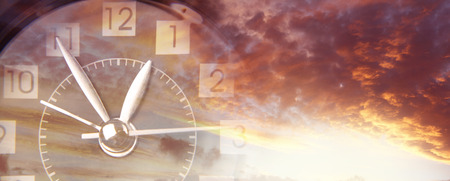 Clock face in bright skyの写真素材