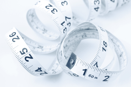 Closeup of coiled measuring tape