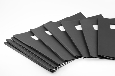 Pile of folders on plain background