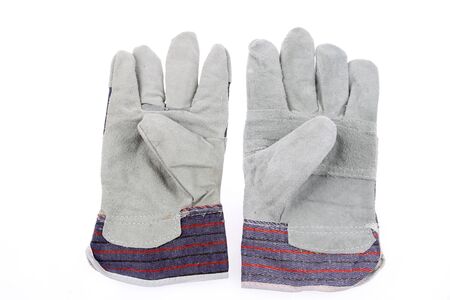 Pair of new work gloves on plain background