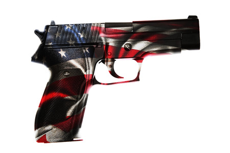 Handgun and American flag compositeの写真素材