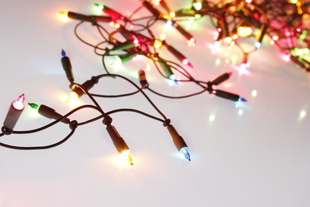 Closeup of Christmas lights glowingの写真素材