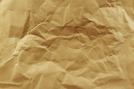 Closeup of brown wrinkled paper texture backgroundの写真素材