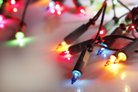 Closeup of Christmas lights glowingの写真素材