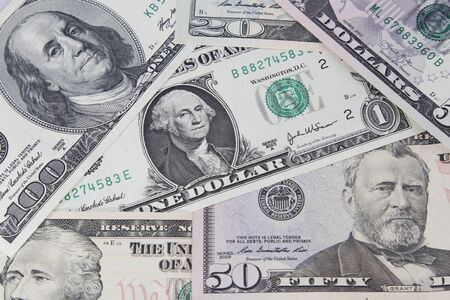 Closeup of assorted American banknotesの写真素材
