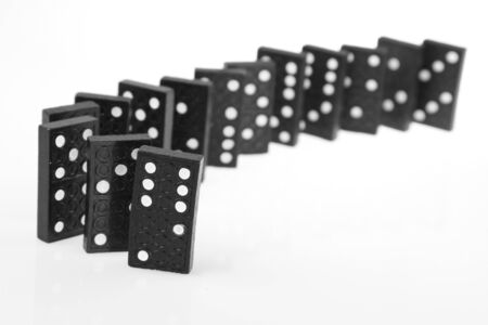 Dominoes standing on plain backgroundの写真素材